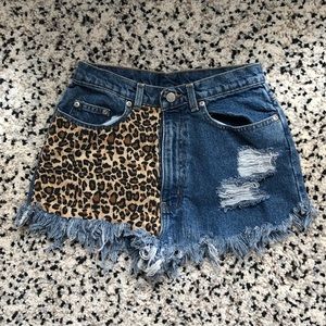 Custom leopard cut off shorts